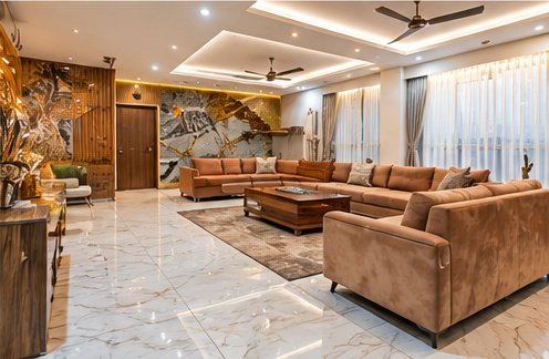 Finished living room with marble flooring and a false ceiling