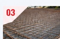 Reinforcement mesh laid ahead of a concrete road slab pour