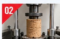 Soil sample under compression testing in a laboratory press